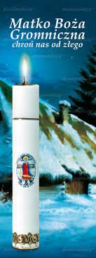 Duża biała świeca. Matko Boża Gromniczna chroń nas od złego